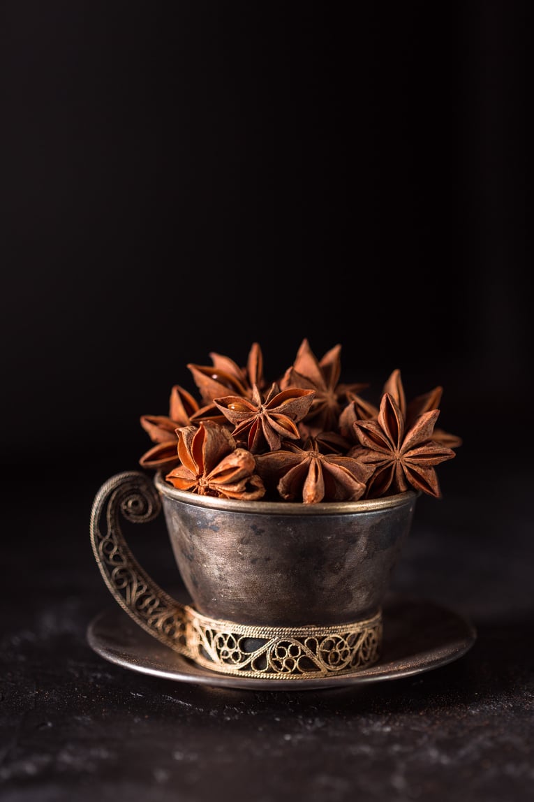 Star Anise in a Pot on Black Background